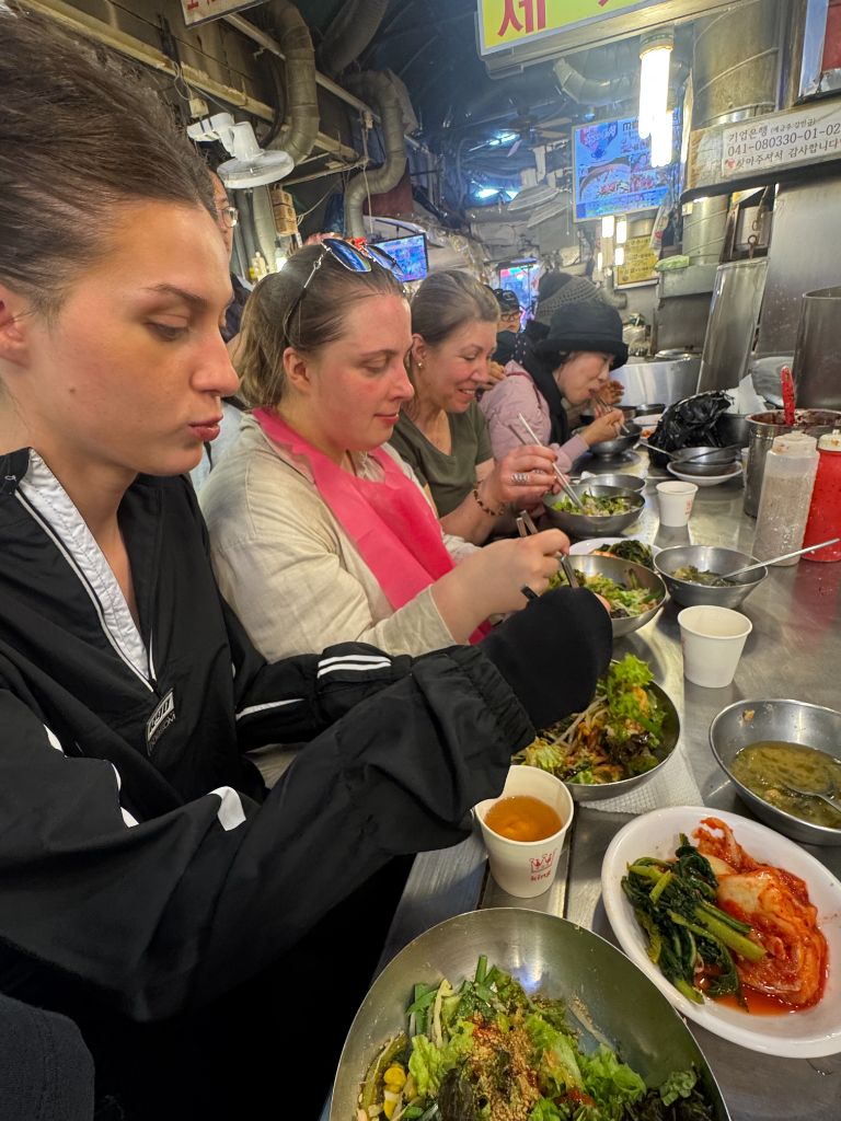 Guests eating at Namdaemun Market