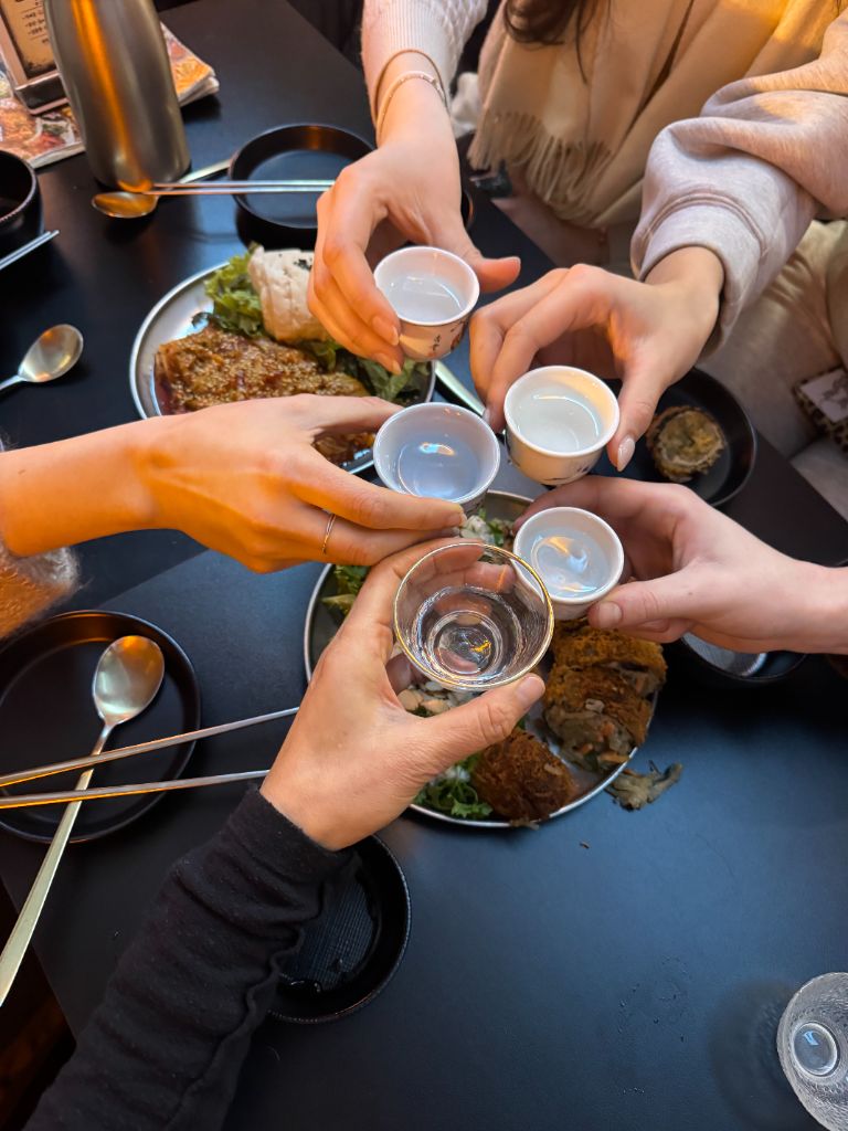 Traditional ceramic cup toast with food