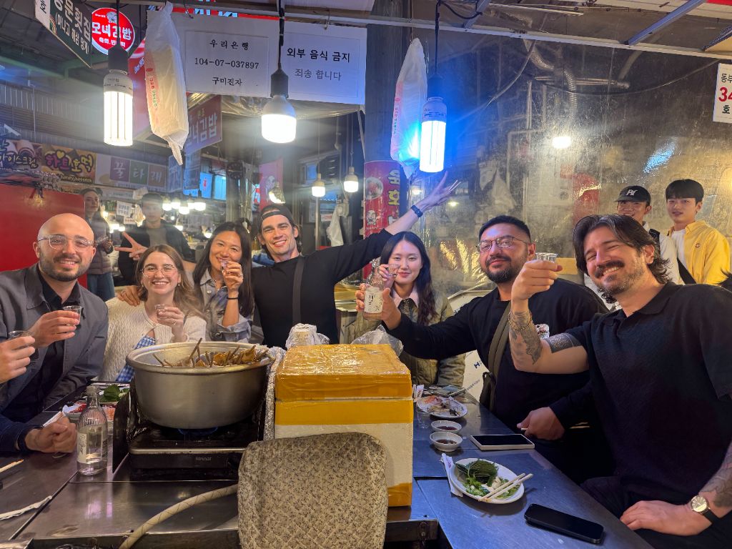 Group cheers at Gwangjang Market