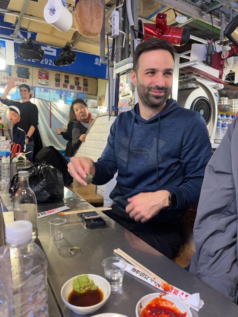 Guest eating at market counter