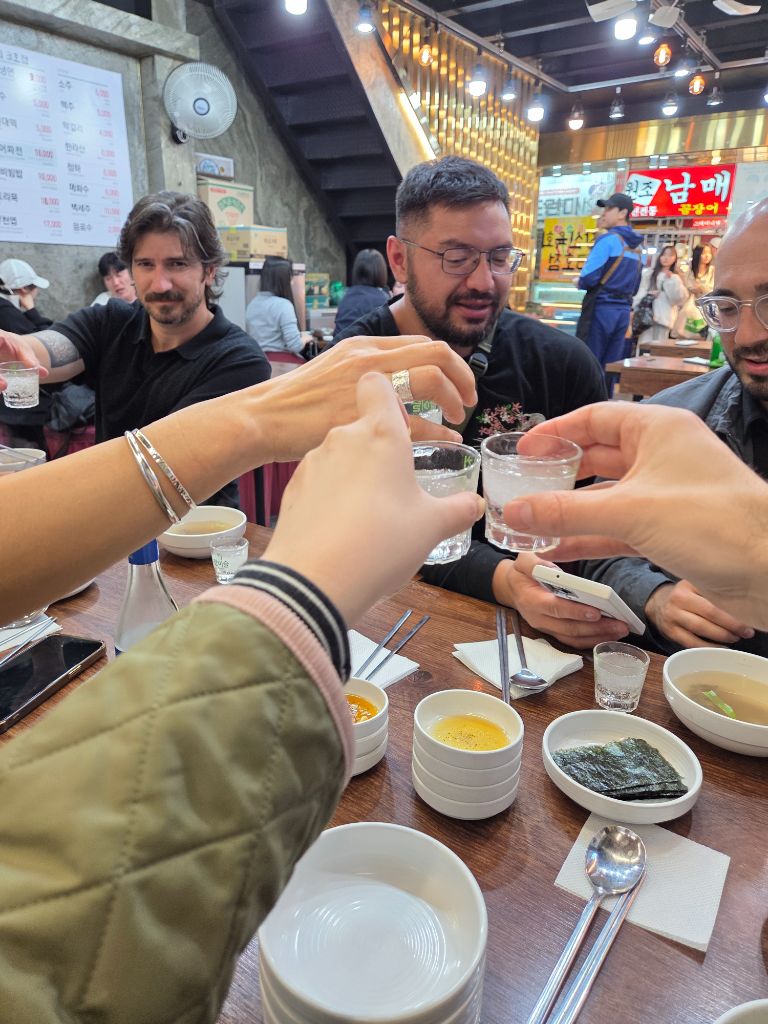 Cheers with soju shots at market
