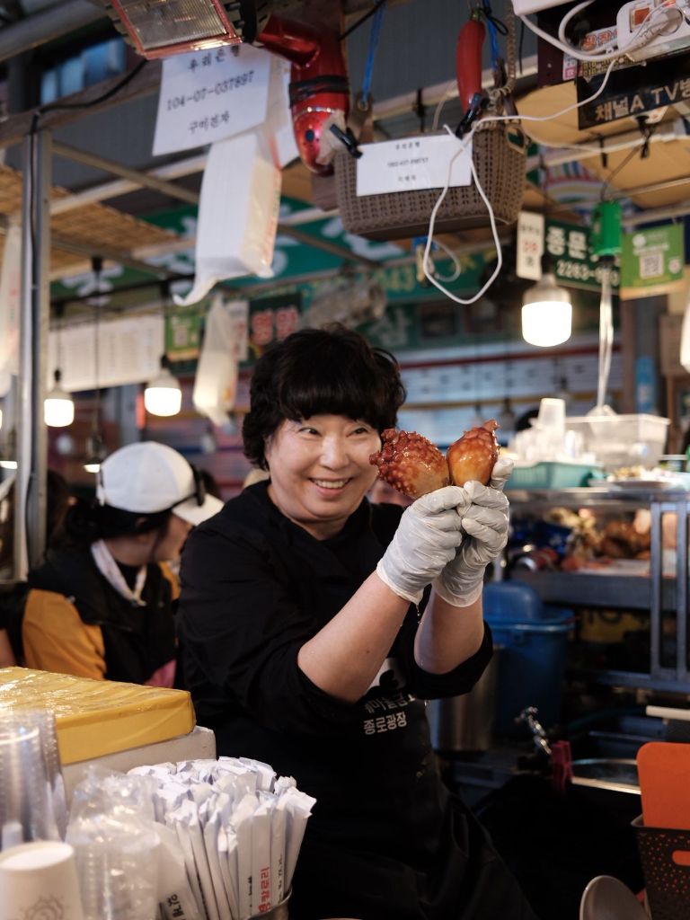Gwangjang Market vendor with octopus