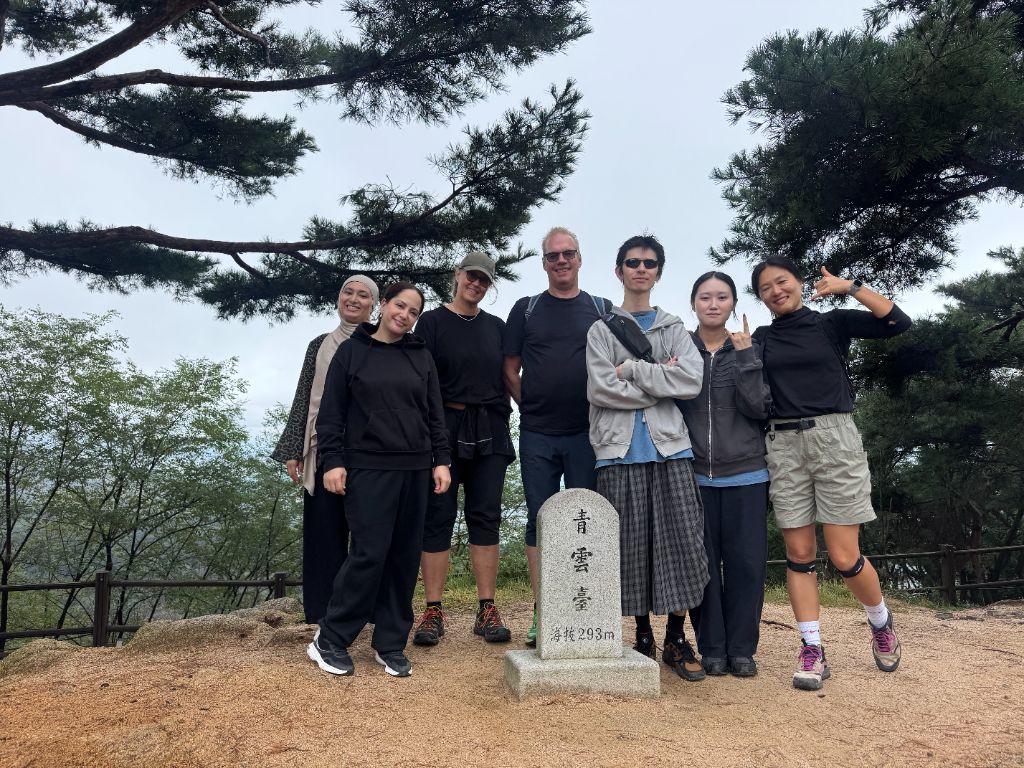 Group at Cheongundae 293m summit marker
