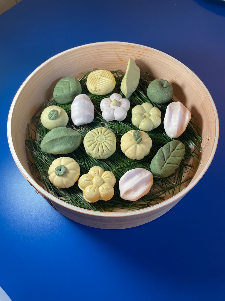 Colorful flower-shaped tteok in steamer